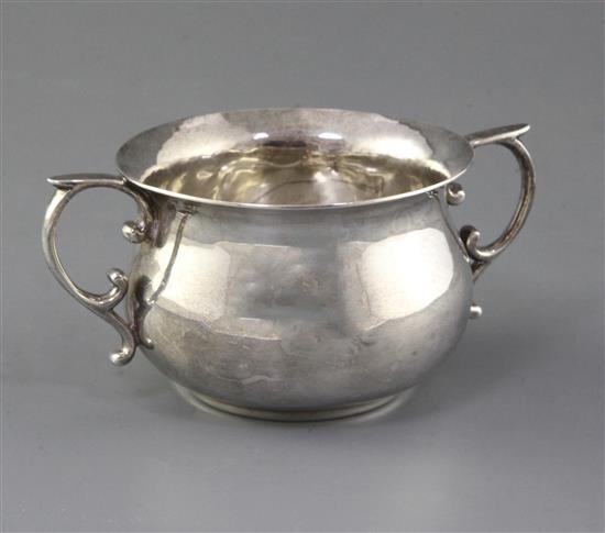 A modern silver two handled sugar bowl by Rodney C. Pettit, 8 oz.